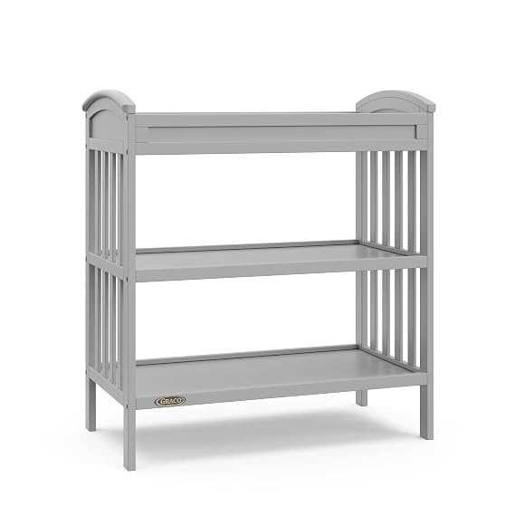 Graco Benton Changing Table with Bonus Water-Resistant Changing Pad (Pebble Gray) - GREENGUARD Gold Certified, Includes Diaper Change Pad with Safety Strap, 2 Open Storage Shelves for Organizing