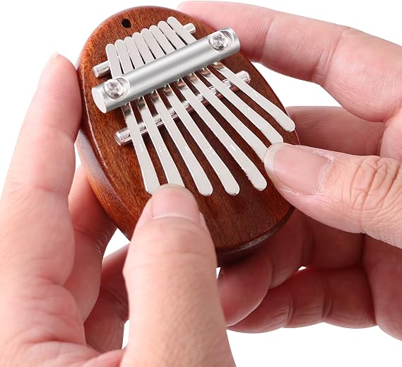 EASTROCK 8 Key Mini Kalimba Finger Thumb Piano with Pendant Gift